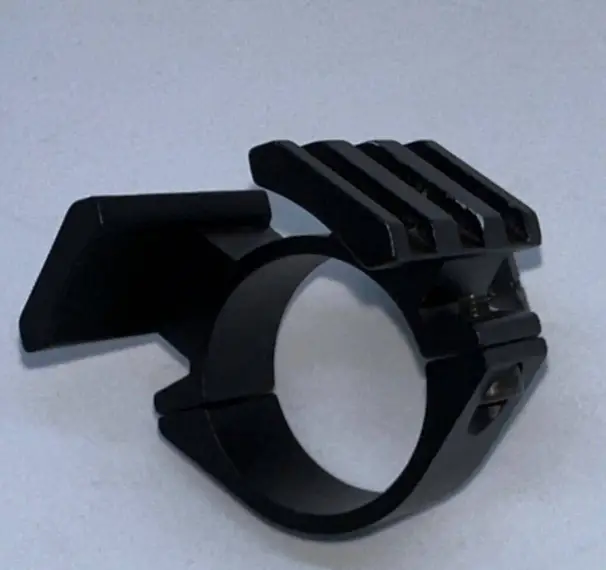 Dubbelmontering för lampa till dagkikare