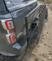 Fällbart beslag till släpvagnskorg - fäll upp